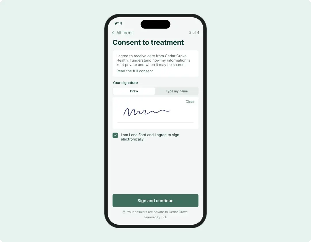 A client signing a consent form on their phone