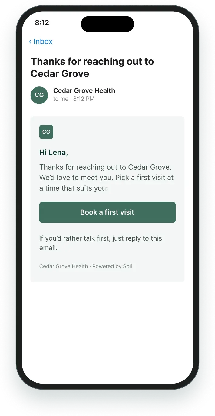 The first reply email on the client’s phone, thanking them and offering a button to book a first visit